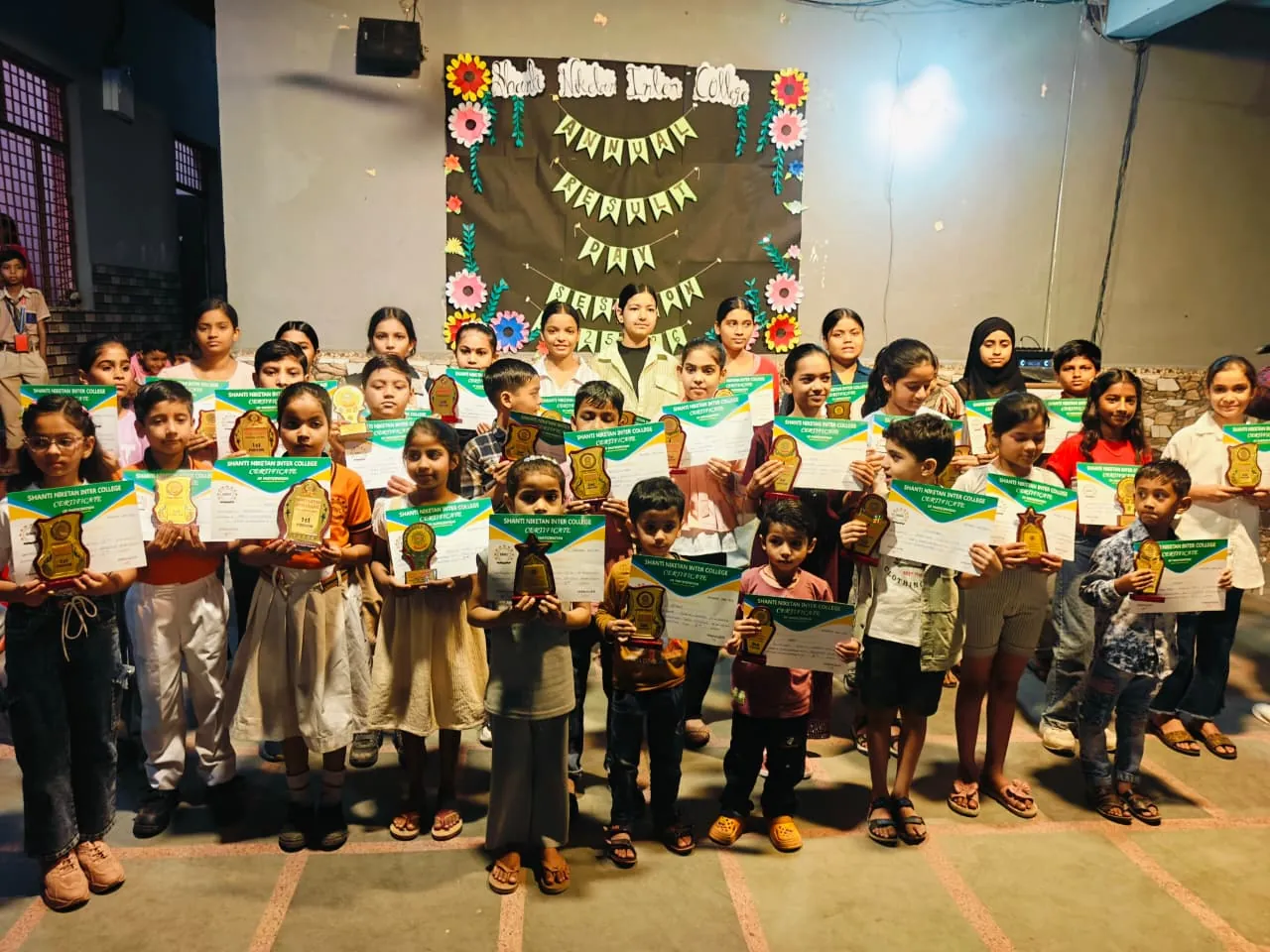 Students receiving awards during a school assembly